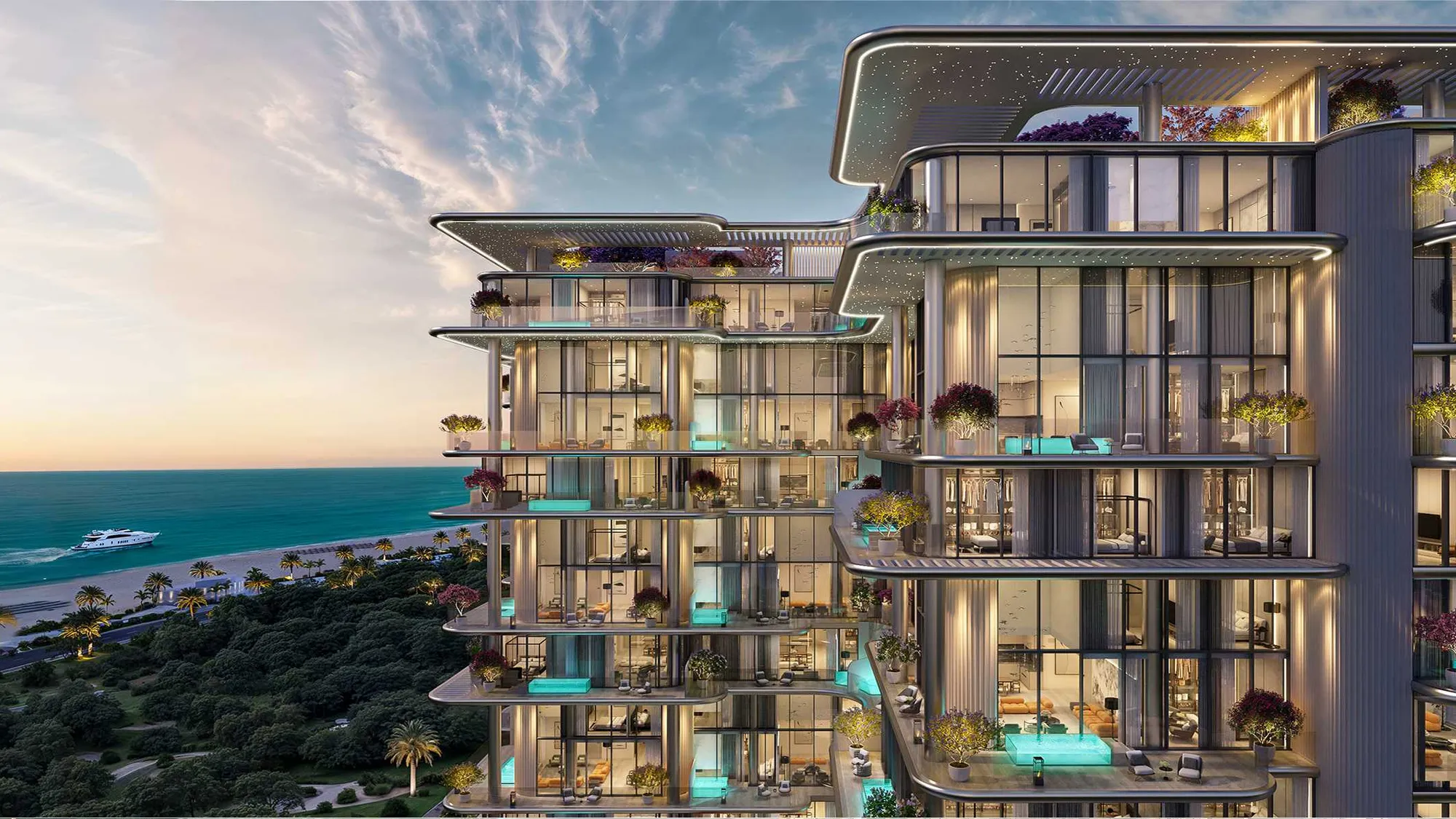 Villa del GAVI's glass facade and planted terraces above the beach at sunset